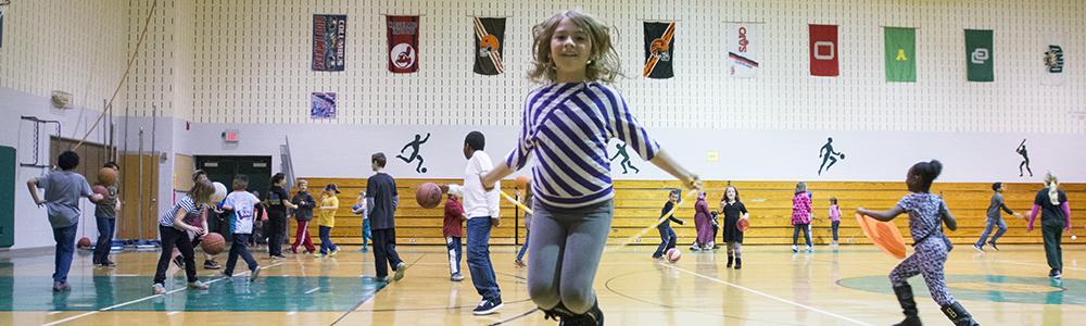 Kid jumping rope.