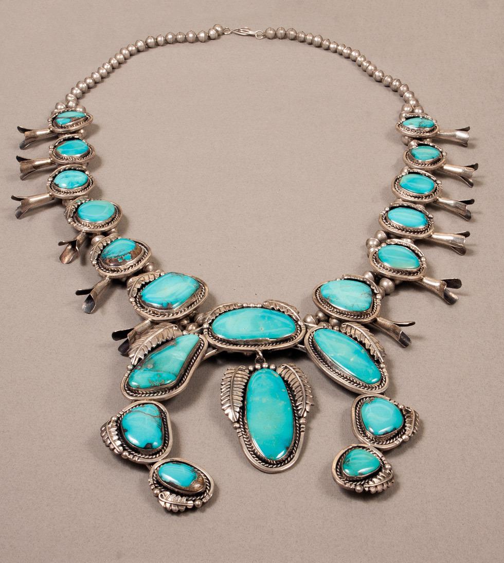 Bisbee Turquoise Squash Blossom necklace, date unknown, Navajo, 89.016.243. Gift of Edwin L. and Ruth E. Kennedy.