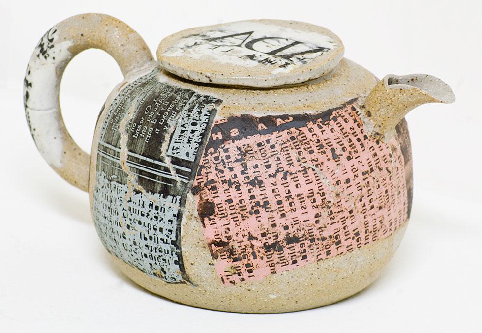 Teapot, 1994, Martin Mohwald, stoneware, xerox transfer and glazes, 4.25 in. x 8.25 in. x 6 in. (10.8cm x 21cm x 15.2cm), 94.019.1. Gift of the artist.