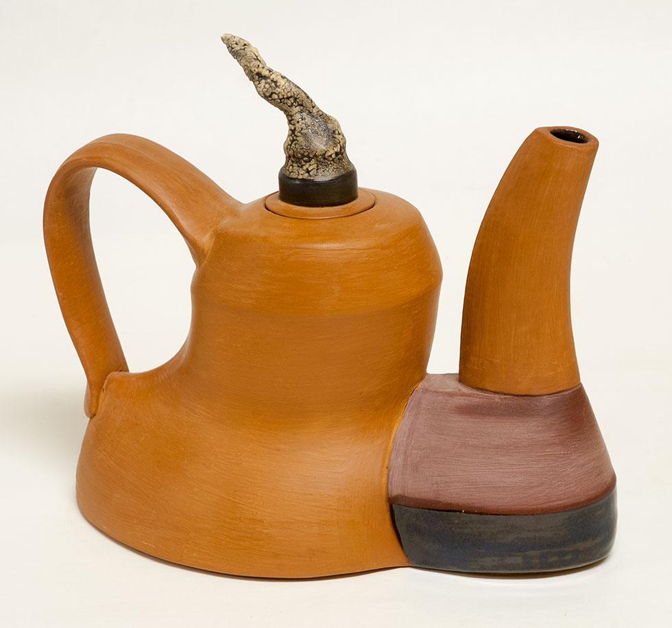 Teapot, 1995, Mark Tomczak, earthenware and glazes, 8.5 in. x 10 in. x 5.125 in. (21.6cm x 25.4cm x 13cm), 97.003.1. Gift of the artist.