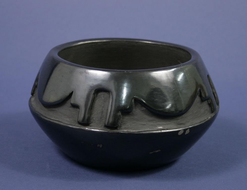 Carved Bowl, c. 1935, Maria Martinez, San Ildefonso Pueblo, NM, earthenware, 3.75 in. x 6.5 in. dia. (9.5cm x 16.5cm dia.), 2009.03.03. Gift of Mrs. Linden Ranels.