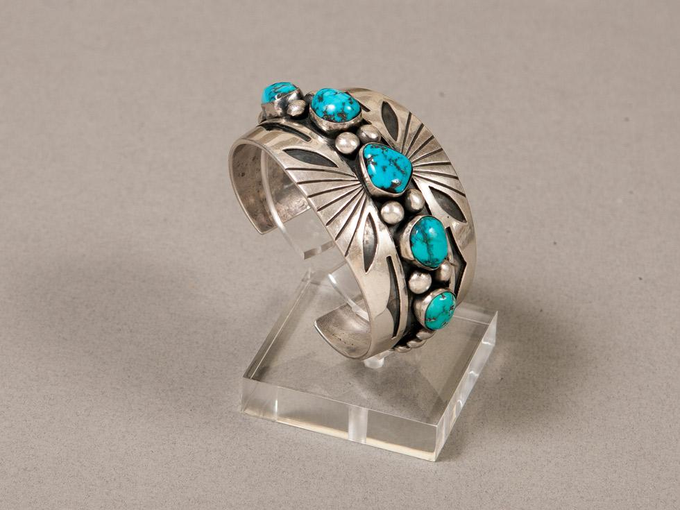 Bracelet with Seven Turquoise Pieces, 1940s, maker unknown, Navajo, 89.016.506. Gift of Edwin L. and Ruth E. Kennedy.