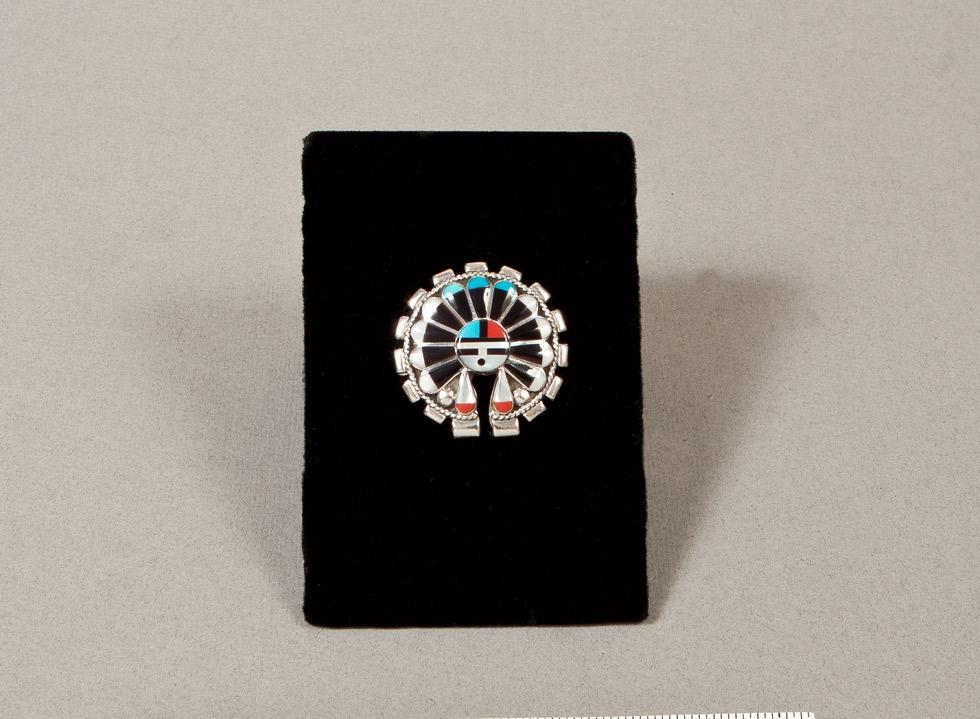 Sunface Pin Pendant, Date unknown, Maker unknown, Zuni, 89.016.733. Gift of Edwin L. and Ruth E. Kennedy.