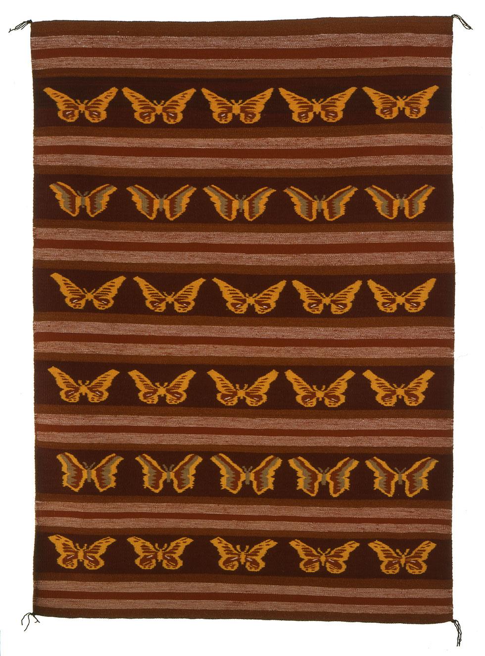Butterfly Pattern Rug Crystal Pictorial, c.1981, Katie Wauneka, 72 x 50in (182.8 x 127cm), 91.023.96. Gift of Edwin L. and Ruth E. Kennedy.