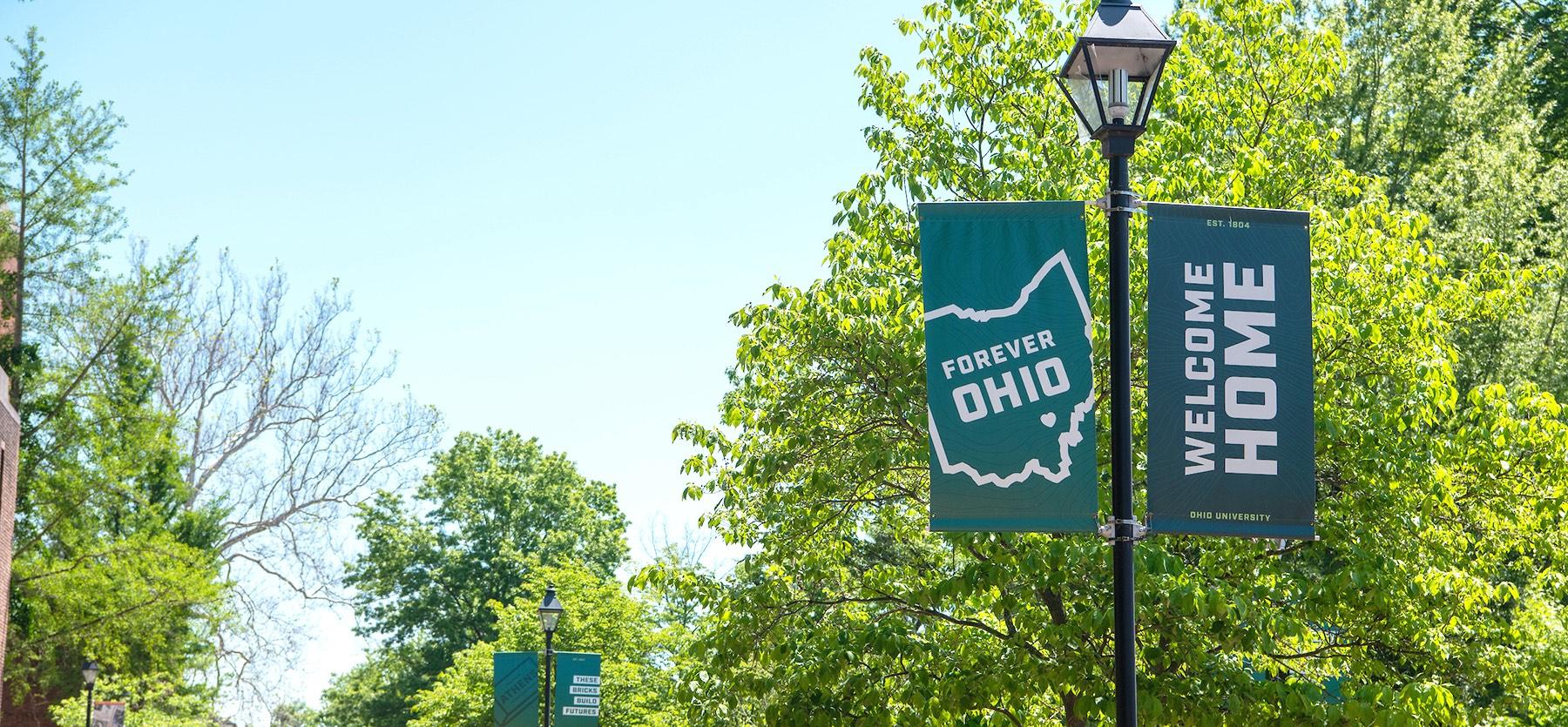 Banners on the Athens campus read Forever OHIO and Welcome Home