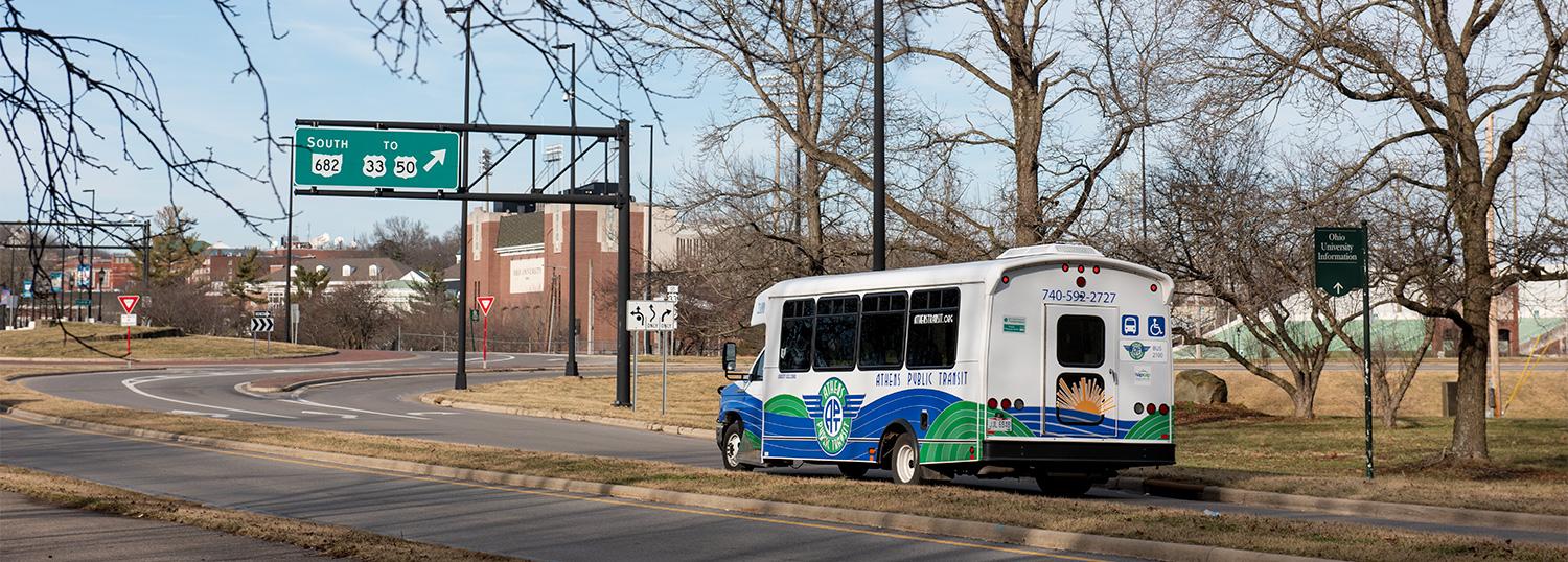 An Athens Public Transportation bus approaches the roundabout at Richland Ave. from the south.