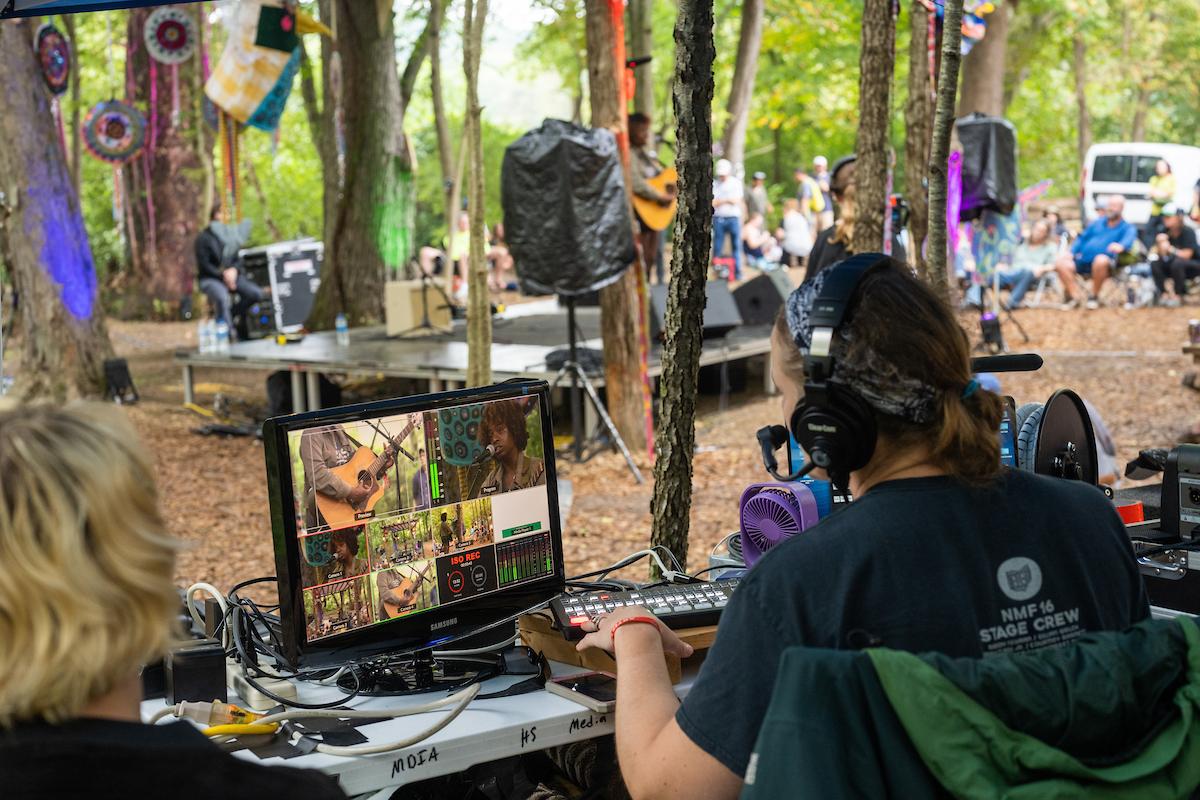 Students work on recording equipment backstage during the 2022 Nelsonville Music Festival