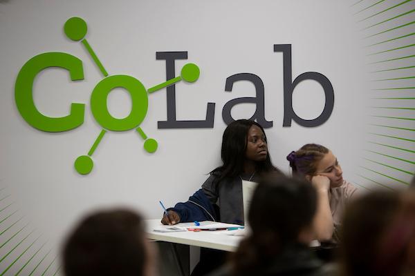 Student in front of CoLab sign