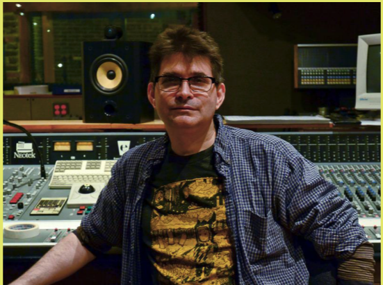 Steve Albini in front of recording equipment