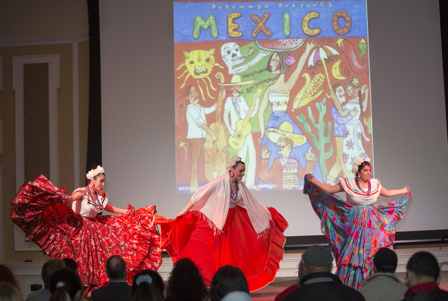 Members of the Hispanic and Latino Student Association dance at the International Women's Day Festival on March 13, 2016. Photo by Emily Matthews