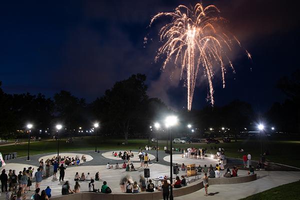 Students watch fireworks at Paw Print Park as part of the Bobcat Block Party.