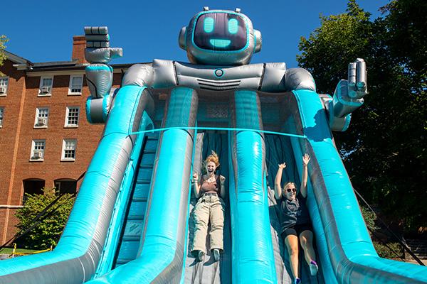 Students enjoy inflatables on South Beach.