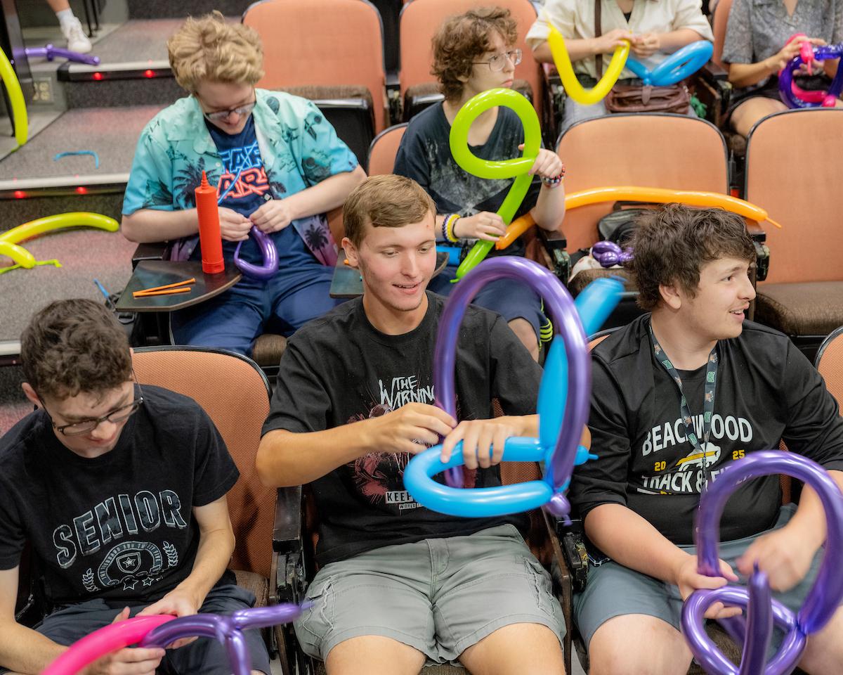 Some students beginning to make their balloon creations take shape.