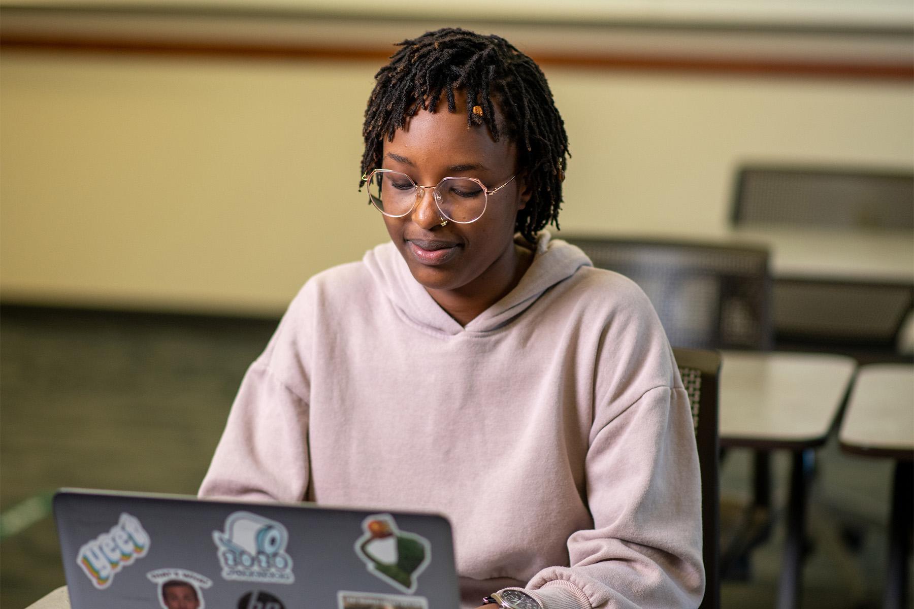 A student works at their computer.