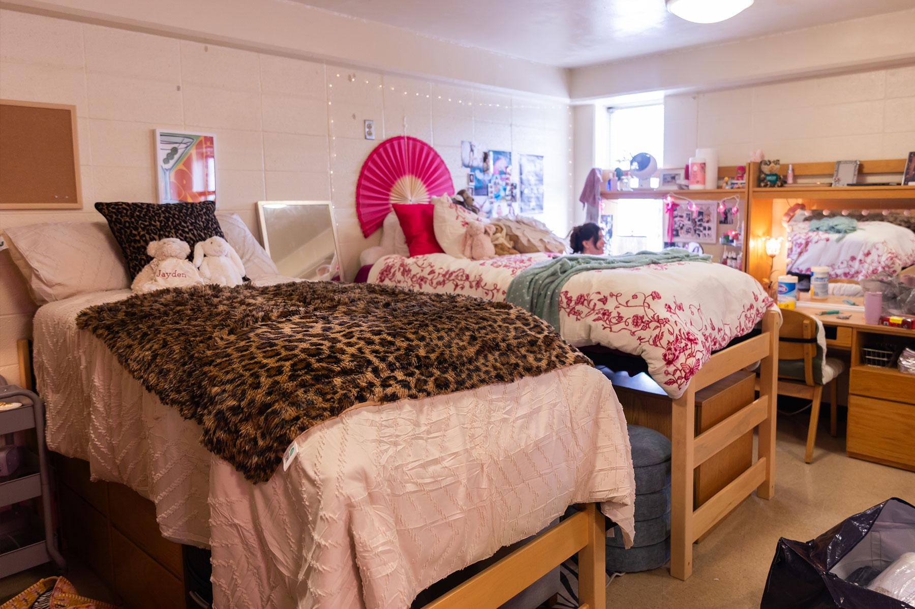Example of a Front Four building double residence hall, showing two lifted beds and storage furniture