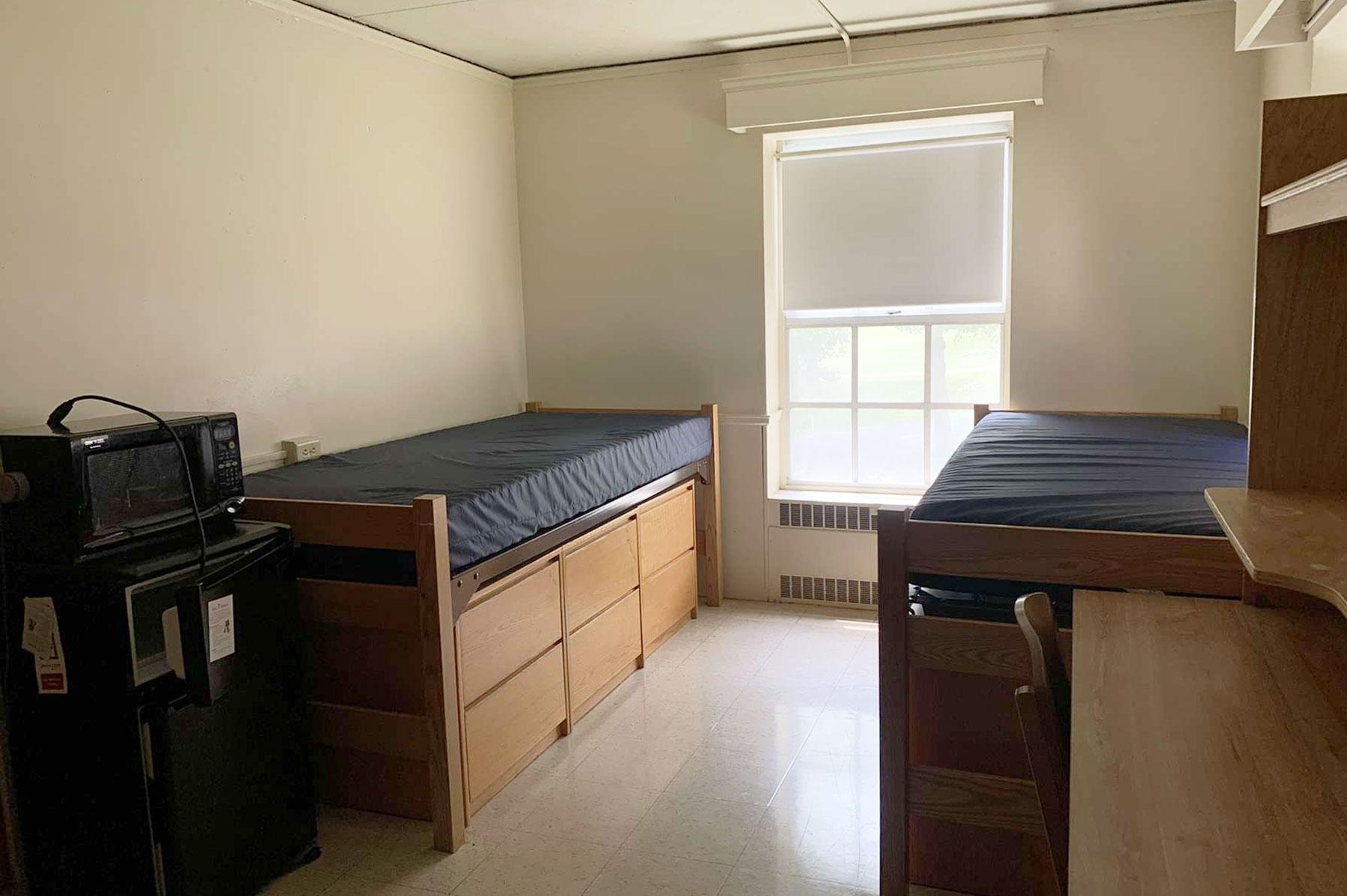Example of a mod room on South Green, with two beds and desks and storage dressers