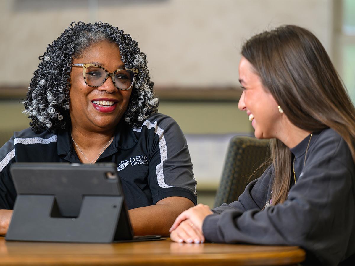 A student meets with an advisor.