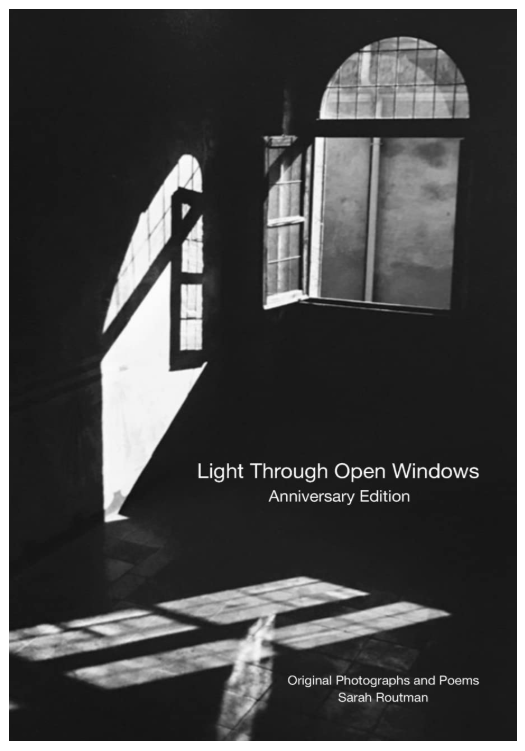 A book cover for the book Light Through Open Windows. The cover is a black and white image of a window with sun rays reflecting on a floor and on the wall beside an open window.