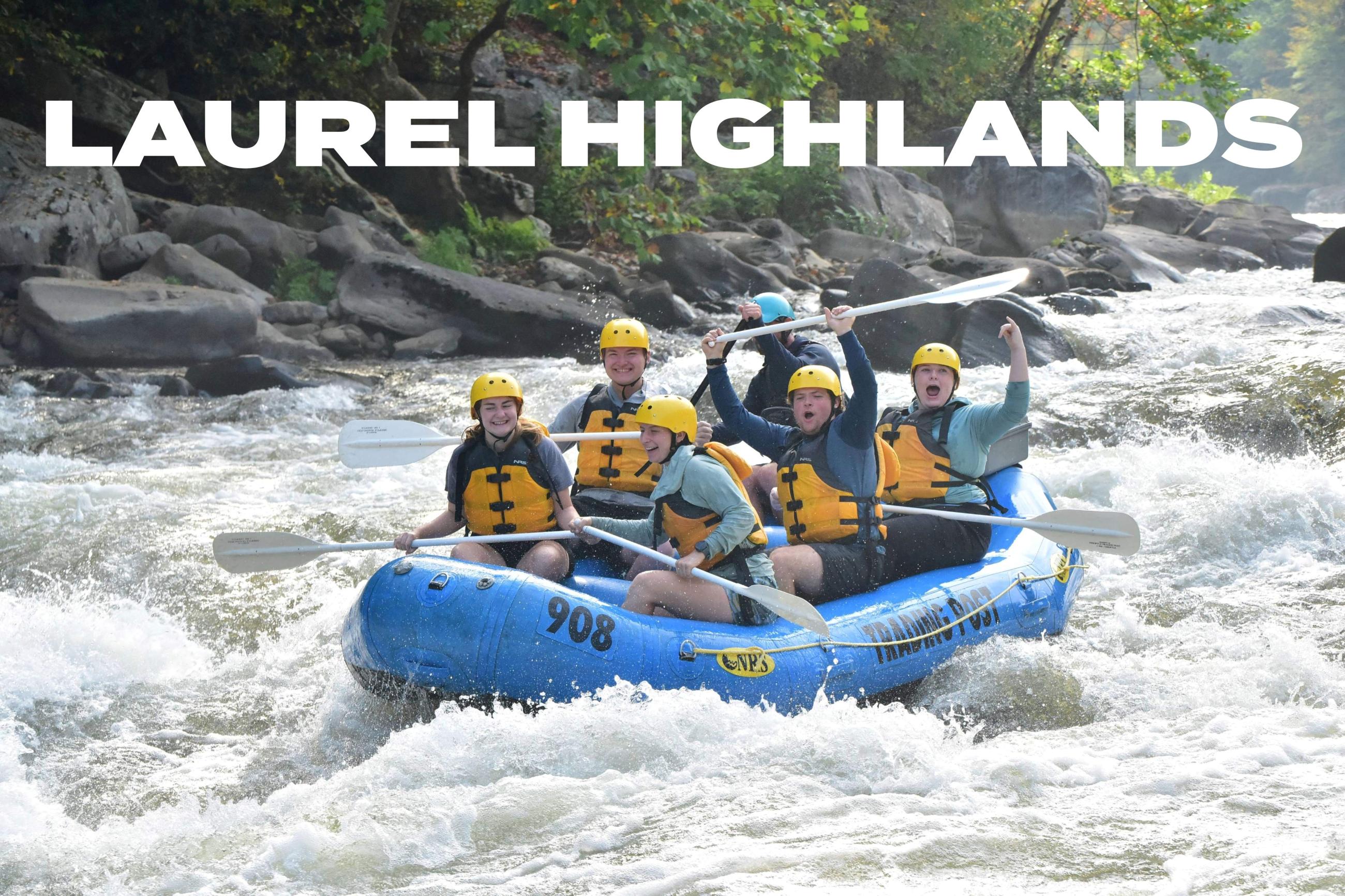 A group whitewater rafting
