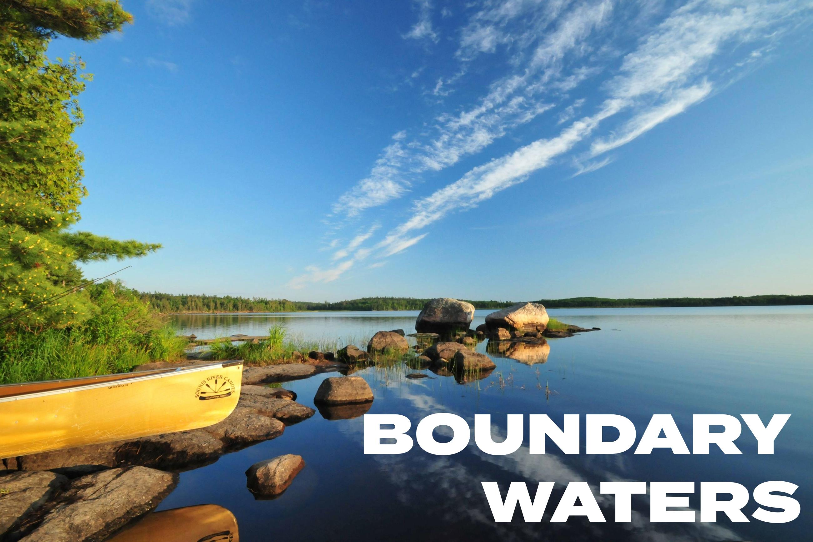 Canoe over rocks and water