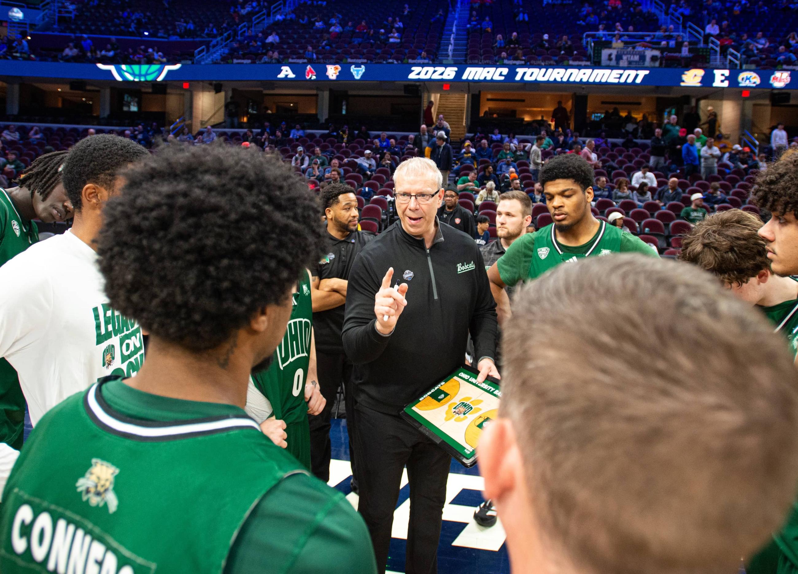 Jeff Boals speaks to his team before the second half of the quarterfinal game