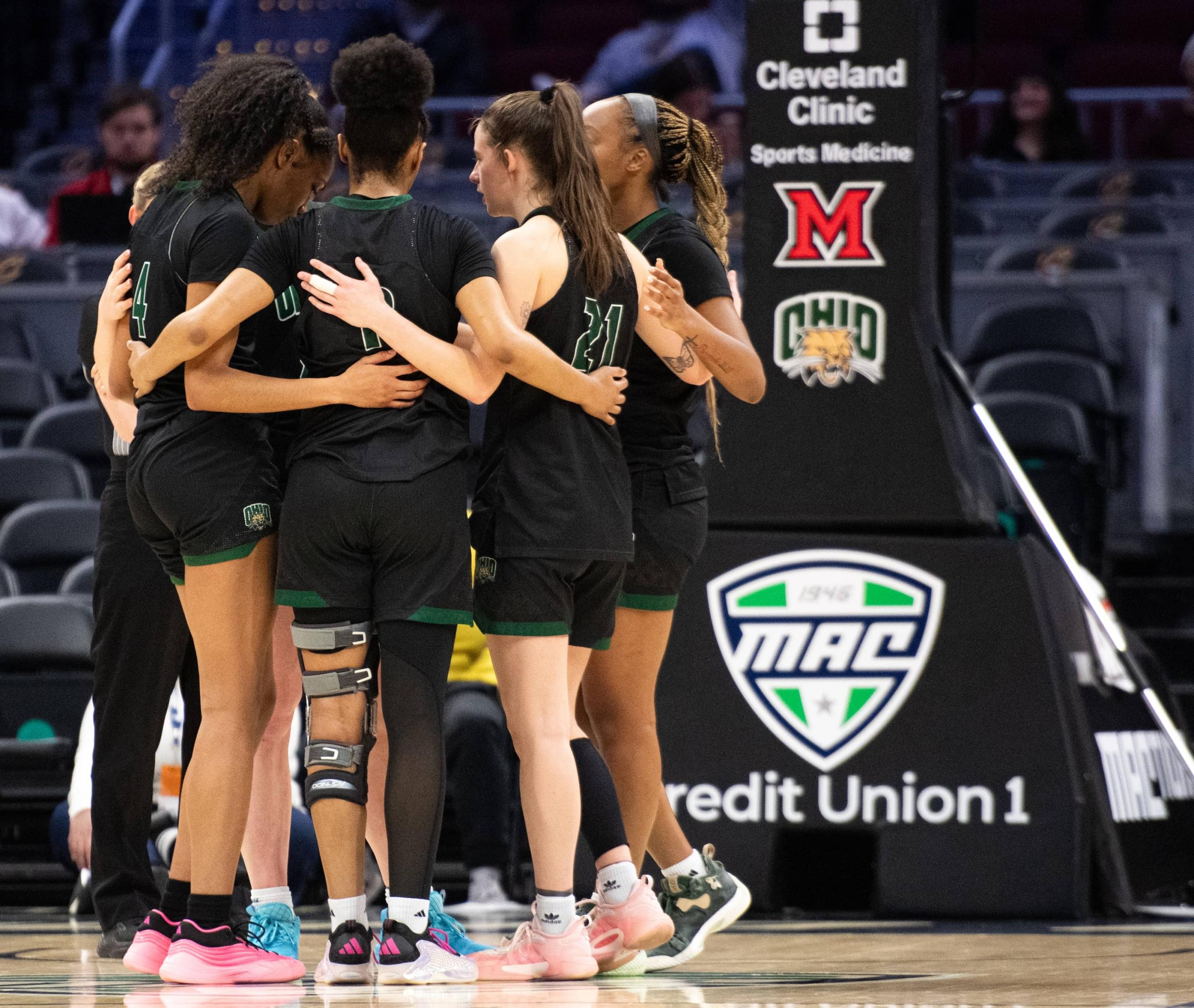 Ohio women’s basketball team members huddle up across the court in the second half of the semifinal game vs. Miami.