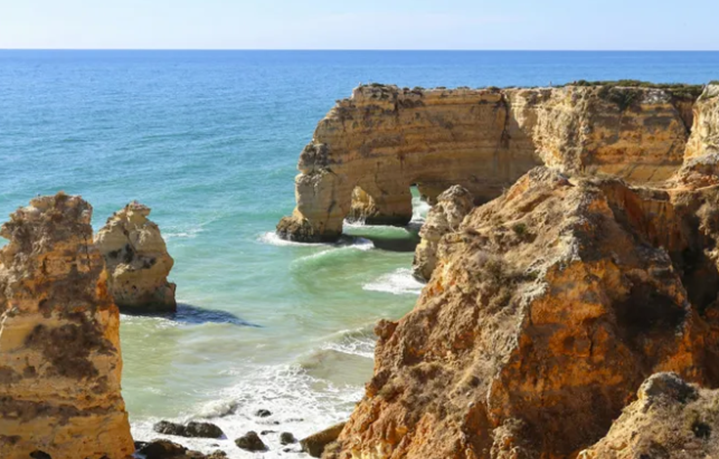 Rock formations along Praia da Marinha in the Algarve region of southern Portugal.