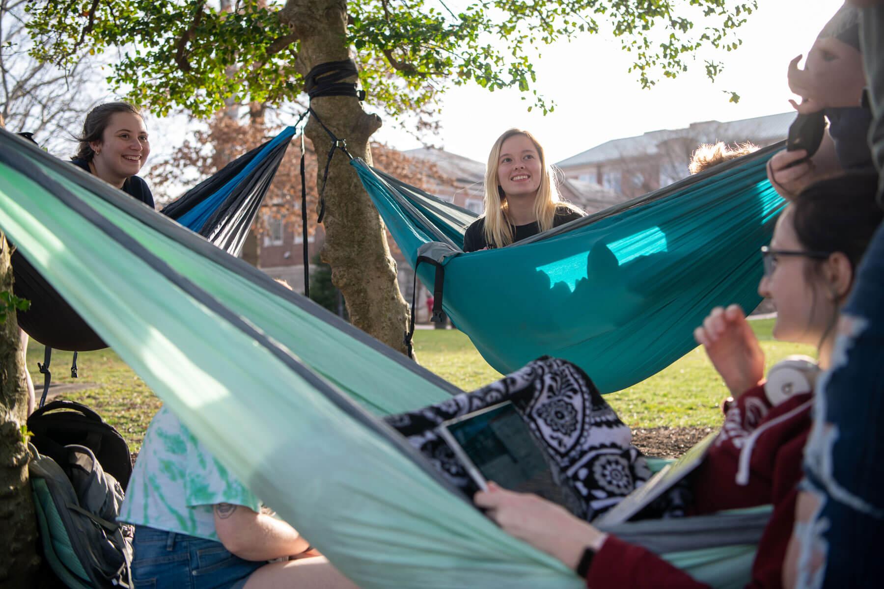 Students study and enjoy some down time together on College Green