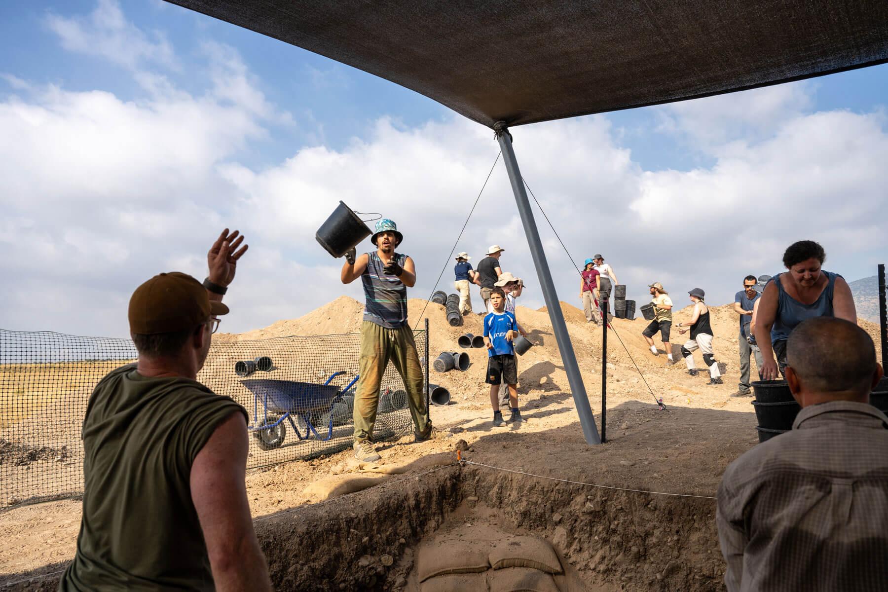 A team participating in an archaeological excavation at a site in Israel