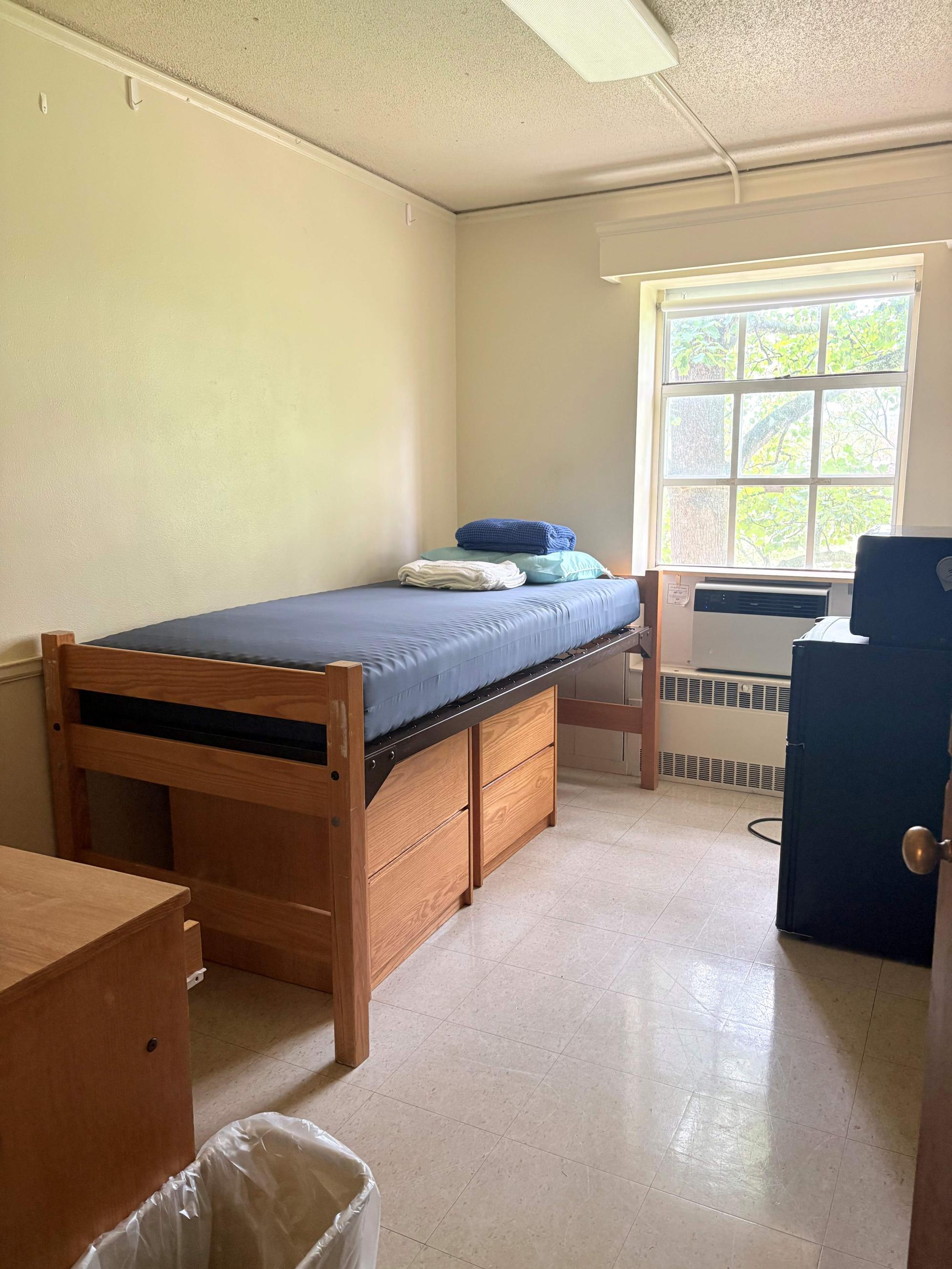 single room in a mod with linens