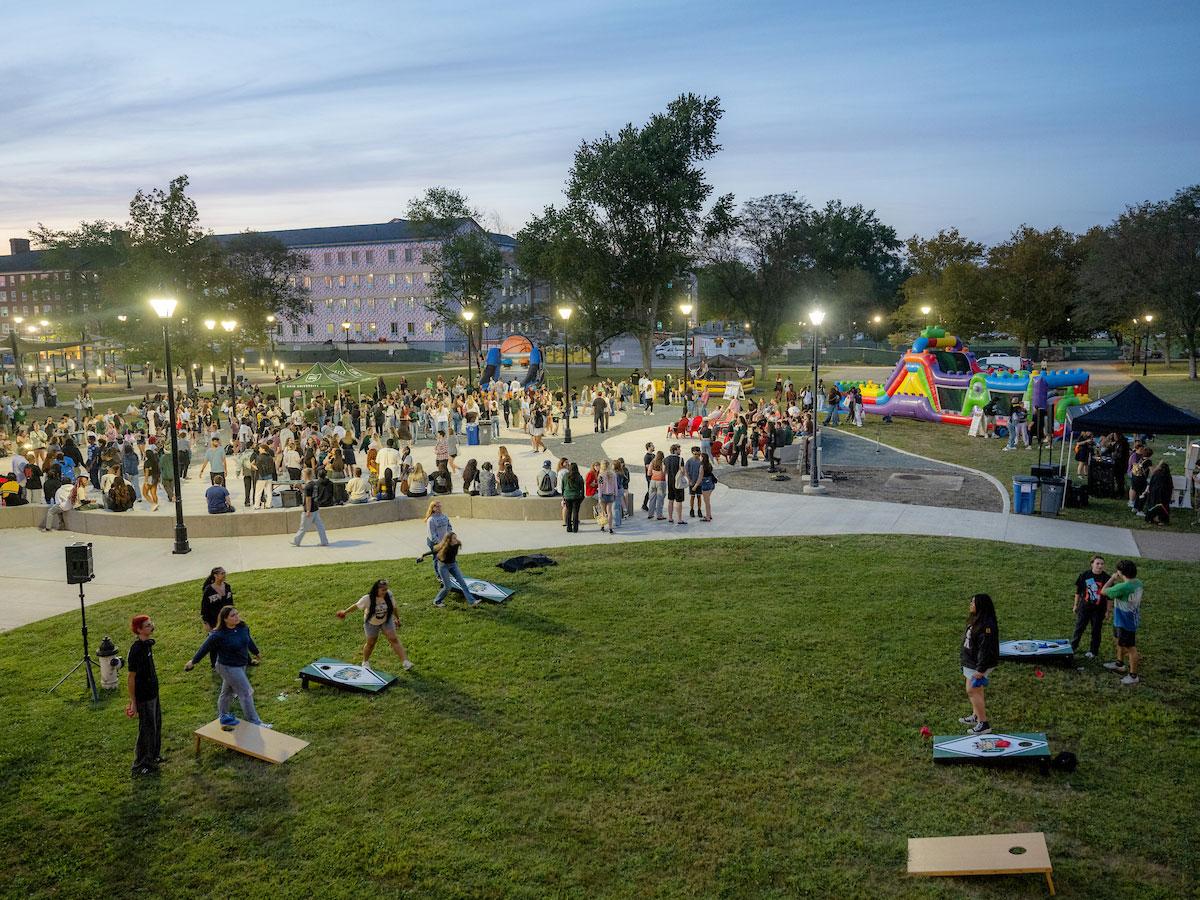 Students hang out on South Green at Ohio University's Athens campus during Welcome Week