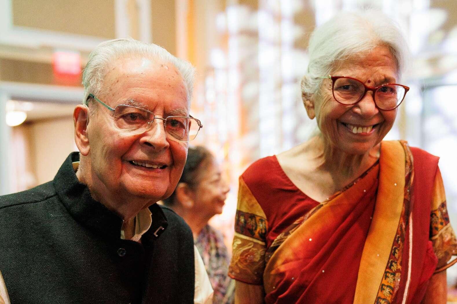 Dr. Raj and Dr. Sushila stand side by side, smiling