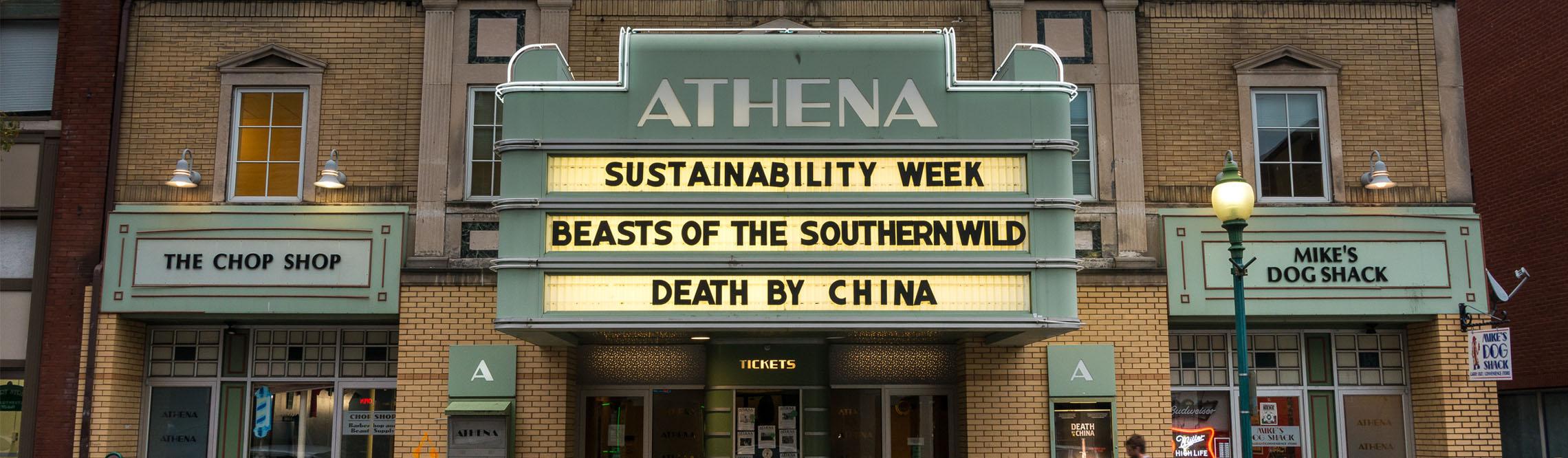 image of the front door of athena cinema 