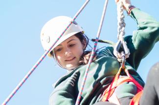 Student on a high ropes course