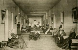 Patients are seen in the hallway of The Ridges during the early 1900s.