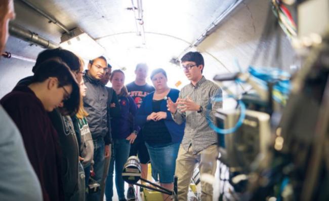 Dr. Zach Meisel and students in the time-of-flight tunnel at the Edwards Accelerator Lab, located on campus.