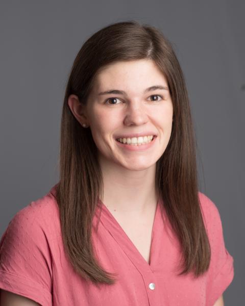 woman with brown hair smiling