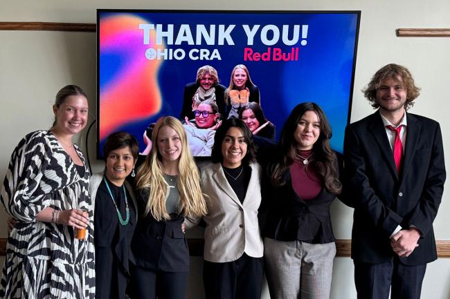 Center for Consumer Research and Analytics members pose at the Red Bull corporate office