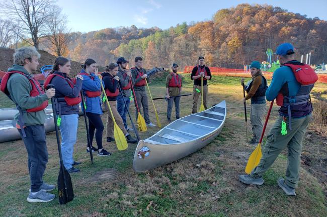 Robe Institute of Leadership Seminar students prepare for a canoe trip.