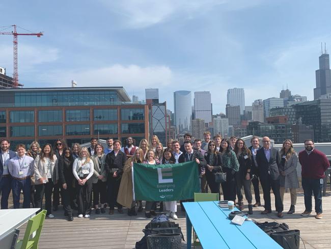 Group of business students pose on a trip with the Emerging Leaders group
