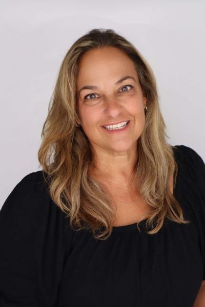 Tuti smiles for a professional portrait