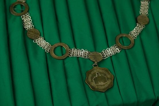 The Ohio University presidential medallion, a large metal necklace worn during formal university ceremonies that features the Ohio University Seal