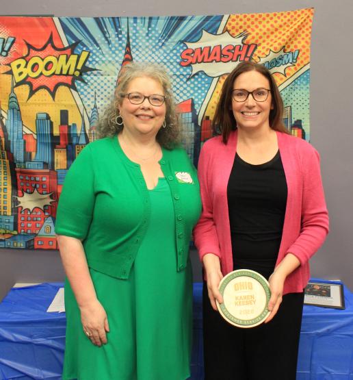 Karen Keesey and Heather Krugman. Karen is holding her award.