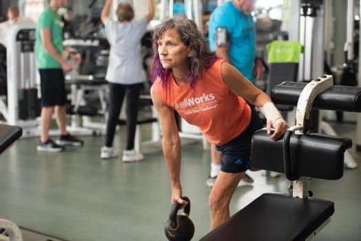 Women on Weights participant lifting kettlebell