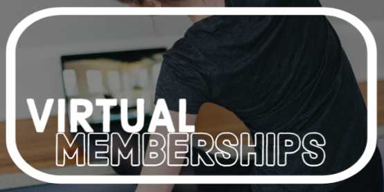 Woman exercising in front of laptop