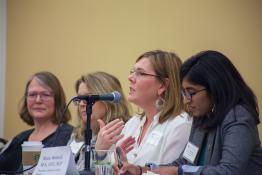 Panelists speak at the women in graduate school conference in 2019