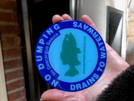 A photo of the storm drain markers used at Ohio University.
