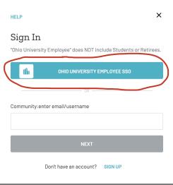 Employees must click the blue button to log in