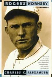 Portrait of baseball player in hat.