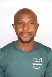 student smiles for a professional portrait